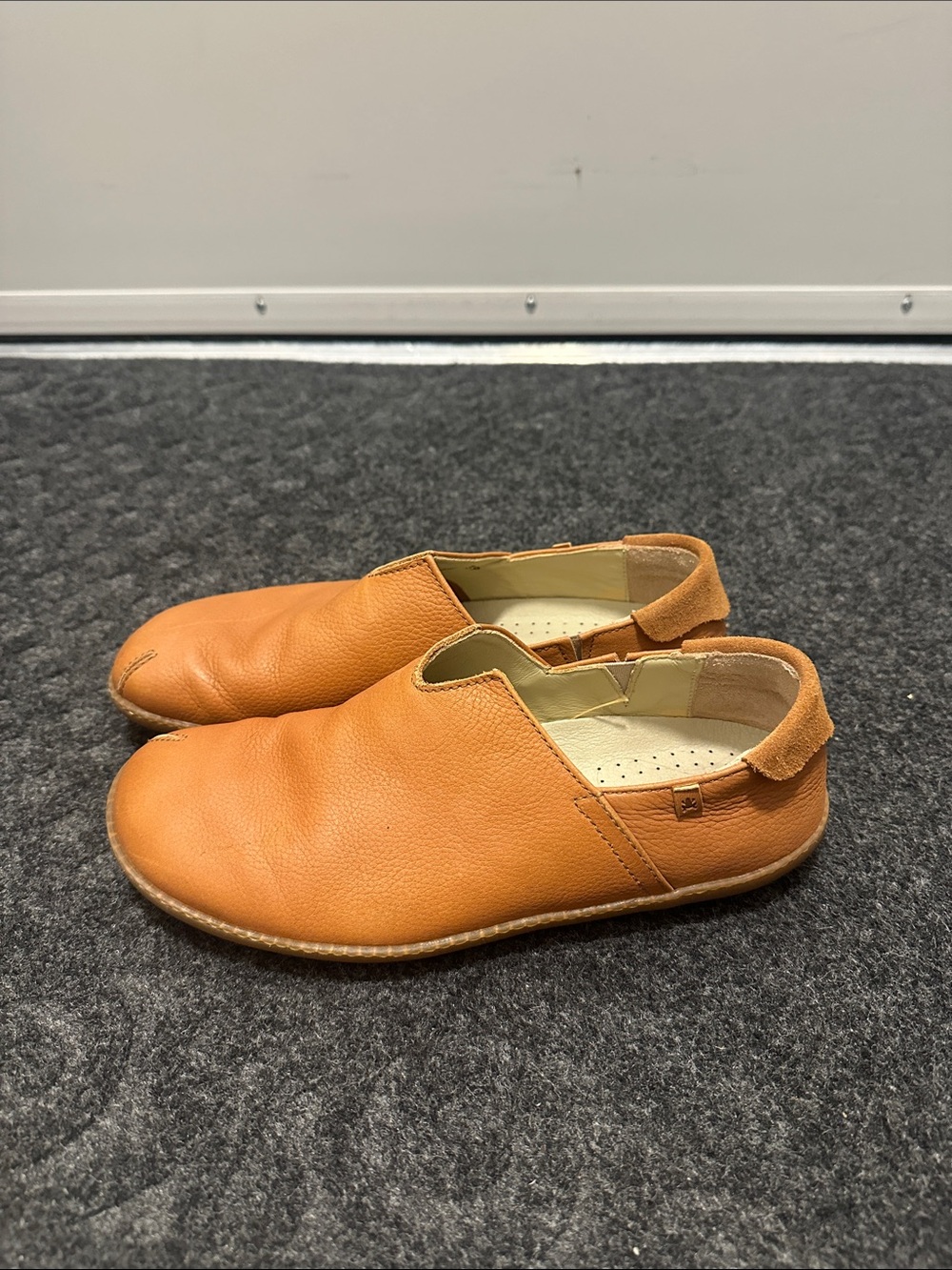 El Naturalista Women's Leather slip ons in Cognac